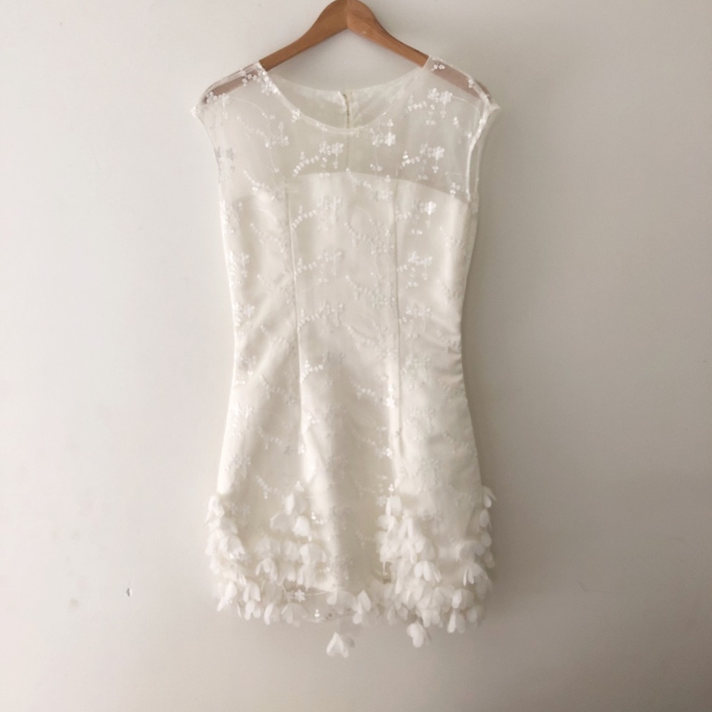 Beautiful white mini dress with hand sewn flowers